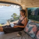 young-adult-using-digital-device-while-travelling